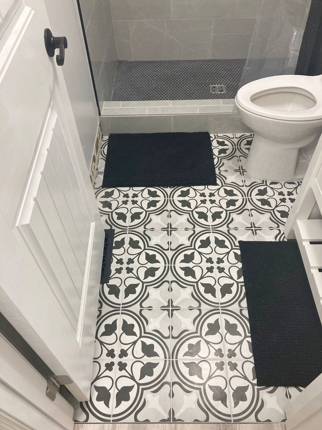 A tub with gold hardware recently done by Footprints Bath and Tile Lawrenceville / Sugar Hill.