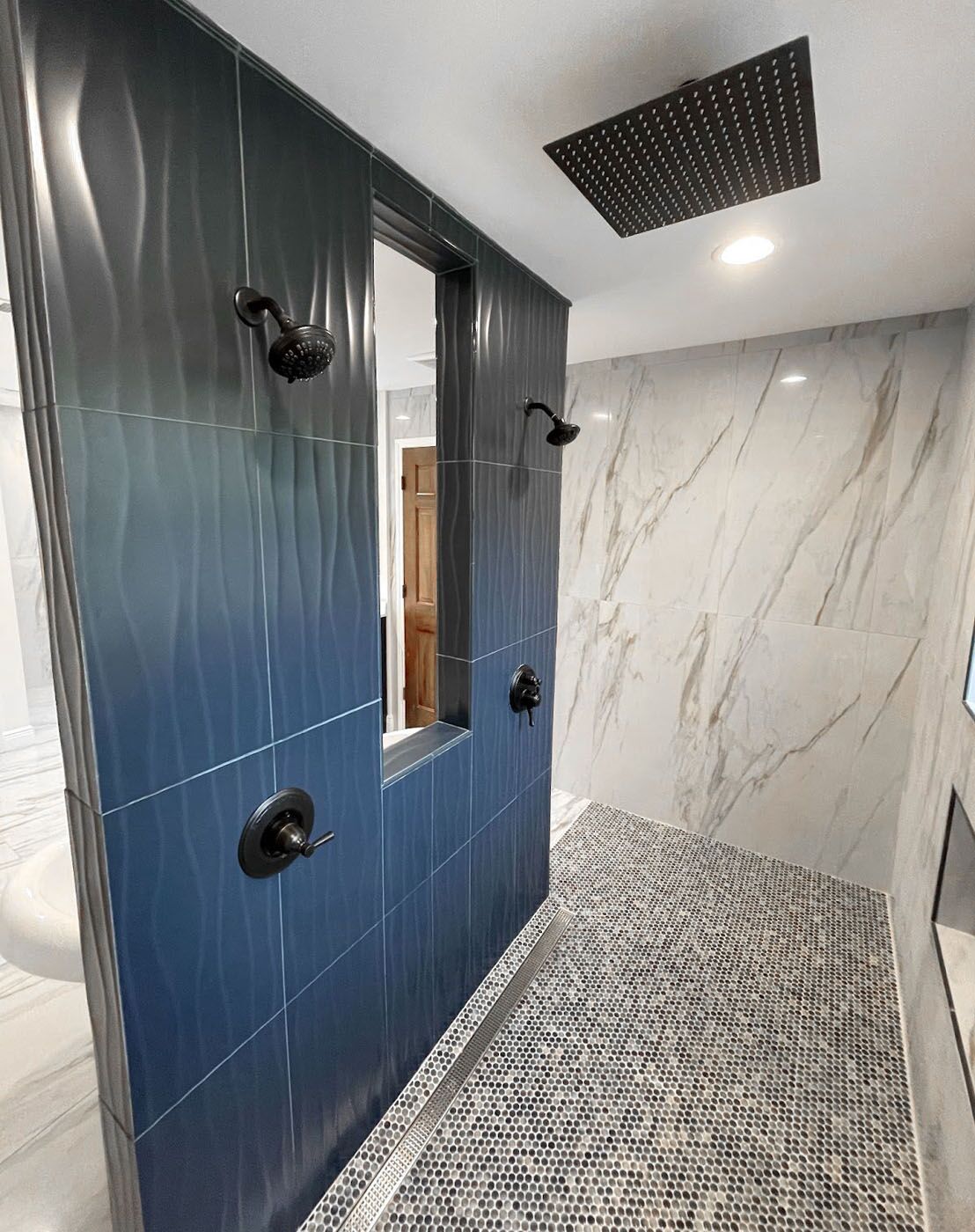 A herringbone bathroom tile pattern from Footprints.